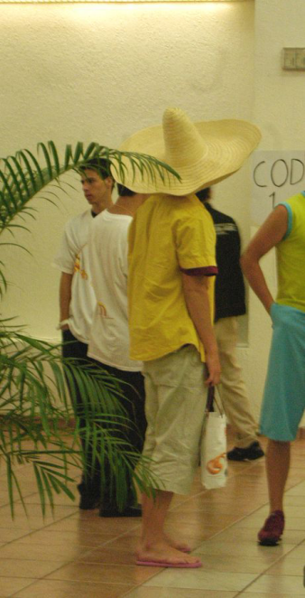 Sombrero and beach shoes at the exam?
